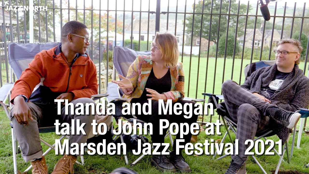 Thanda and Megan talking to John Pope at Marsden Jazz Festival