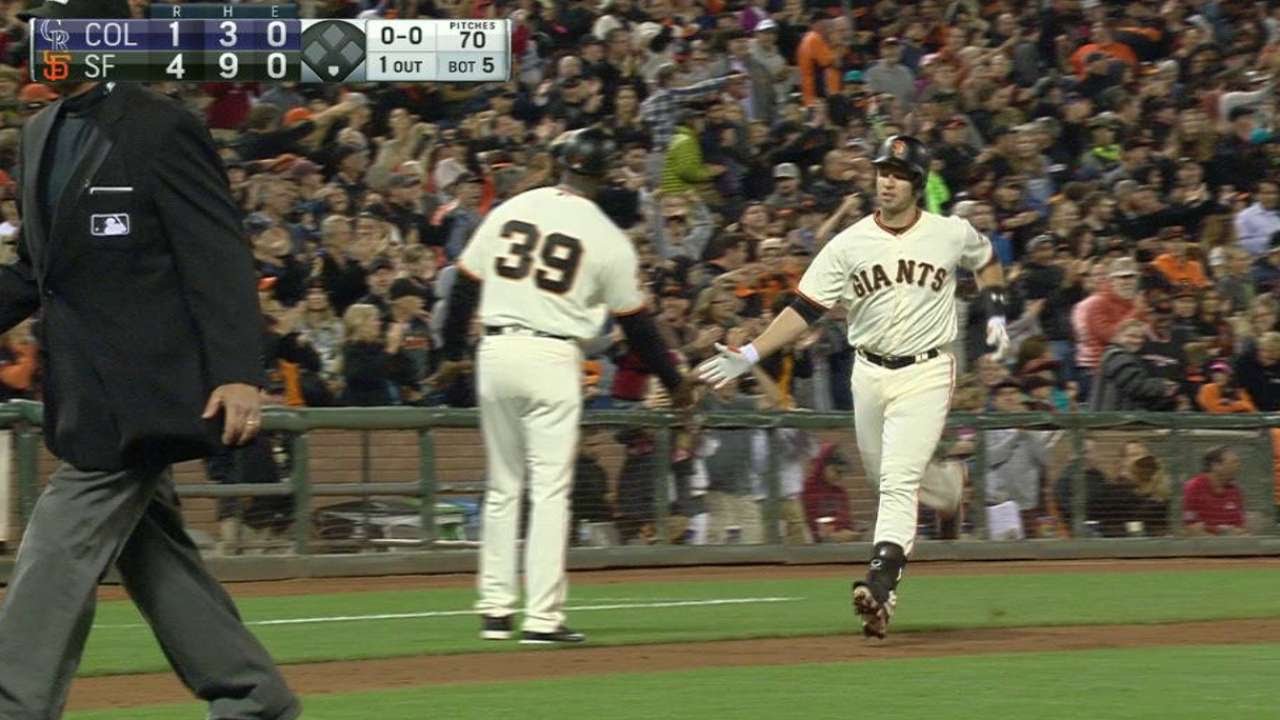 Posey clubs a solo homer for his 1,000th hit