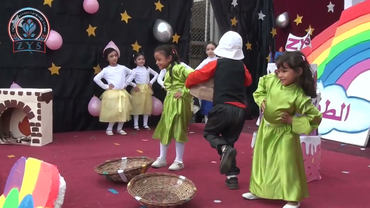 فقرة التورتة بمدارس زهور الياسمين للغات من حفل عيد الطفولة