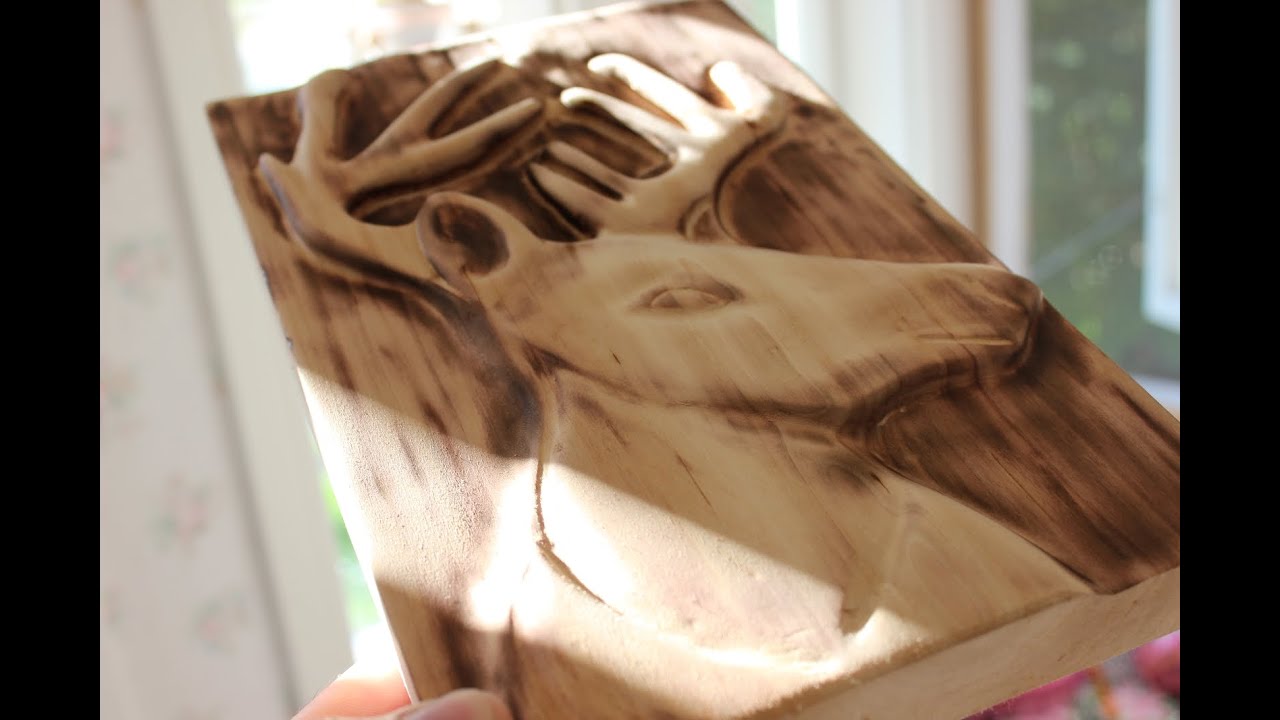 Carving a deer/ reindeer relief with Dremel.