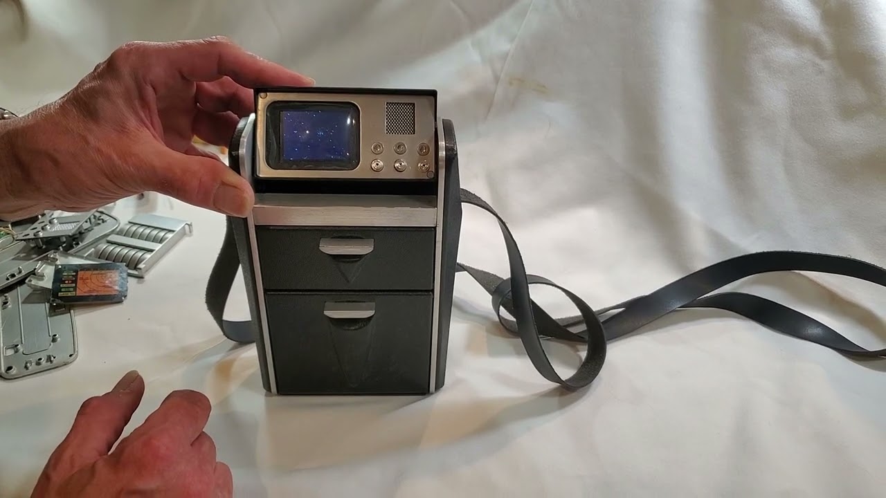Star Trek Diamond Select Tricorder conversion, update with new electronics and met al parts.