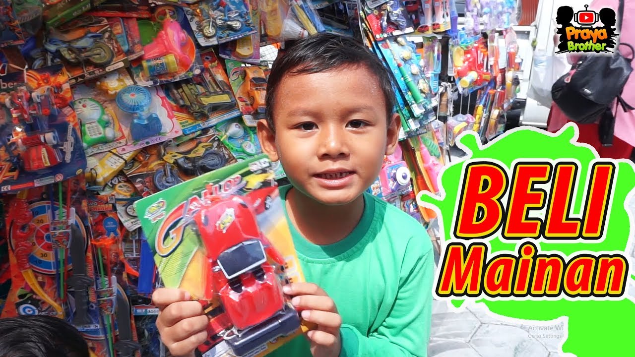 Beli mainan di paman penjual mainan