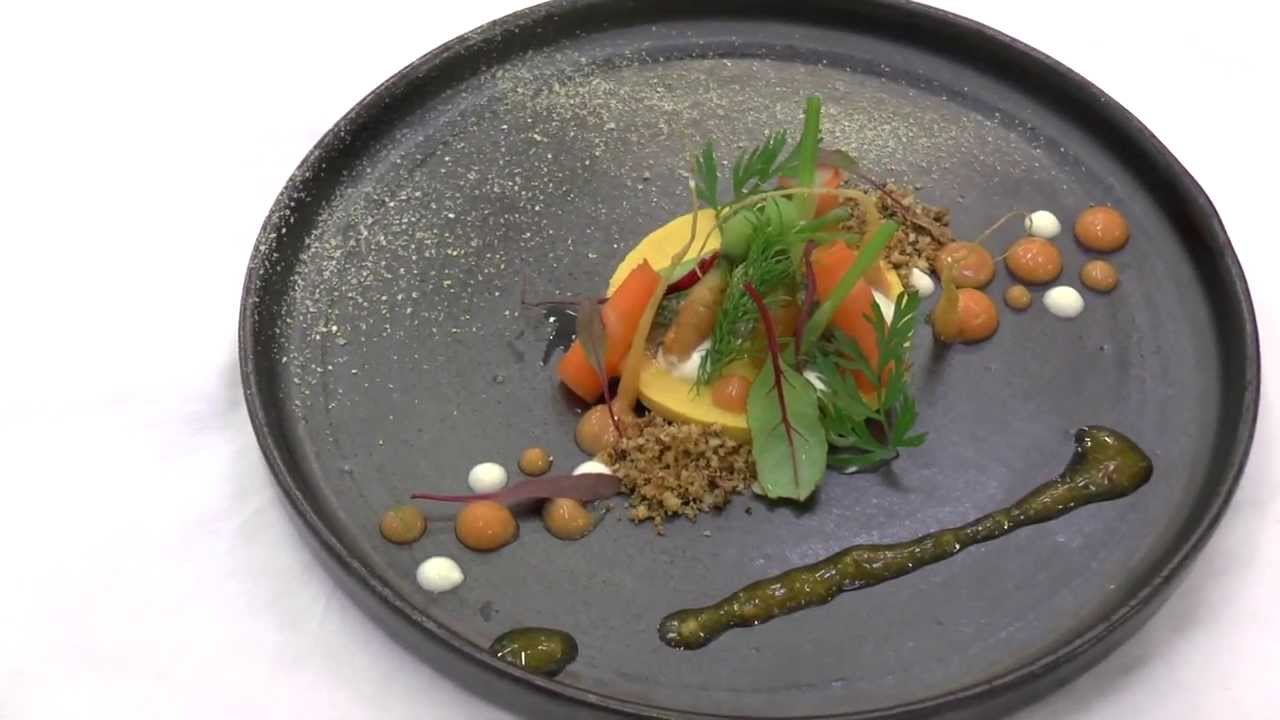 Kristof Marrannes prepares a coquille starter at his Michelin star restaurant