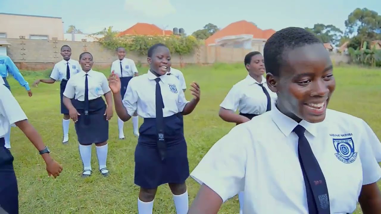 OMUKWANO GW'OMUZADDE by Mutundwe Young Christian Secondary School.