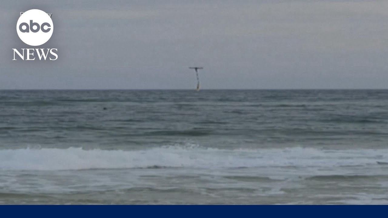 Teen swimmer caught in rip current rescued by drone