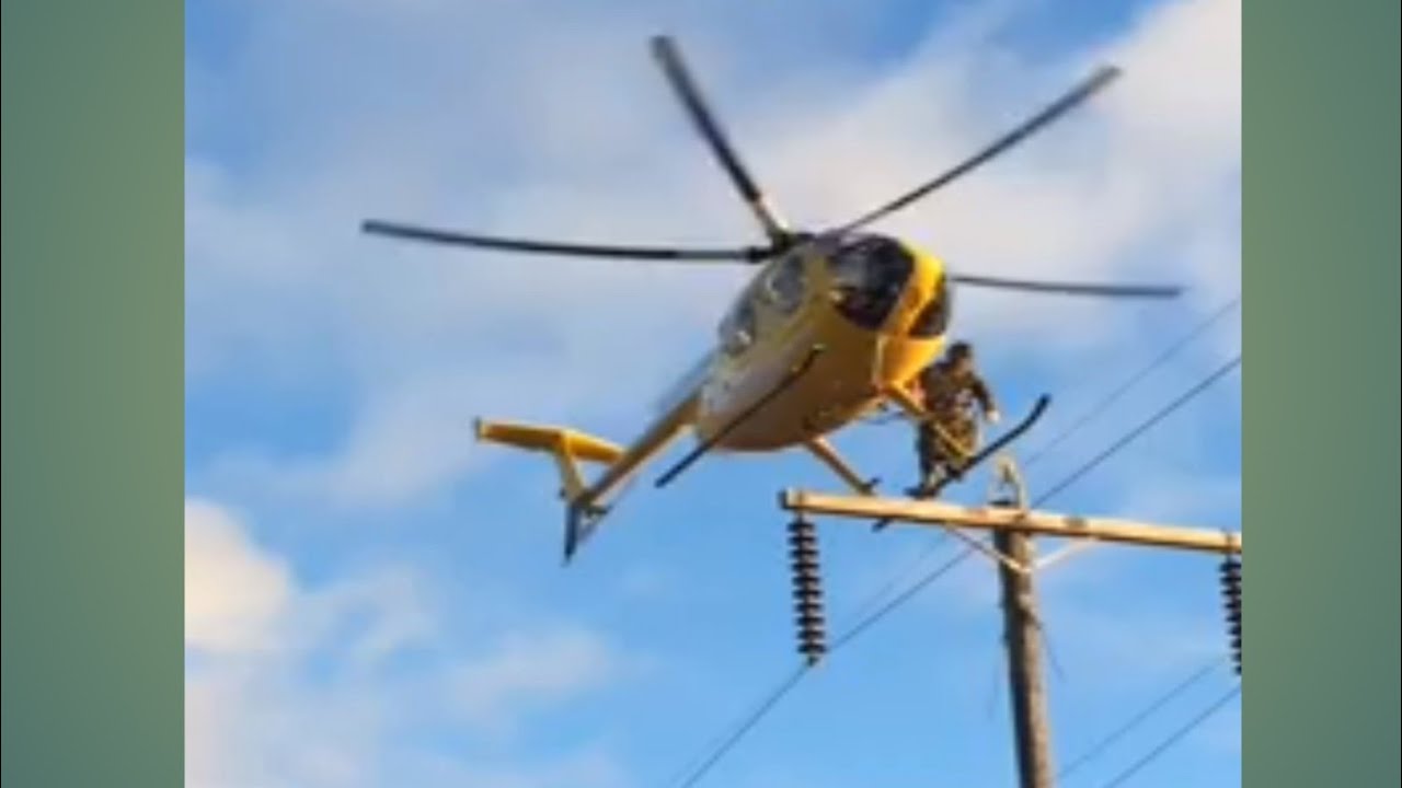 high voltage line repair by helicopter 