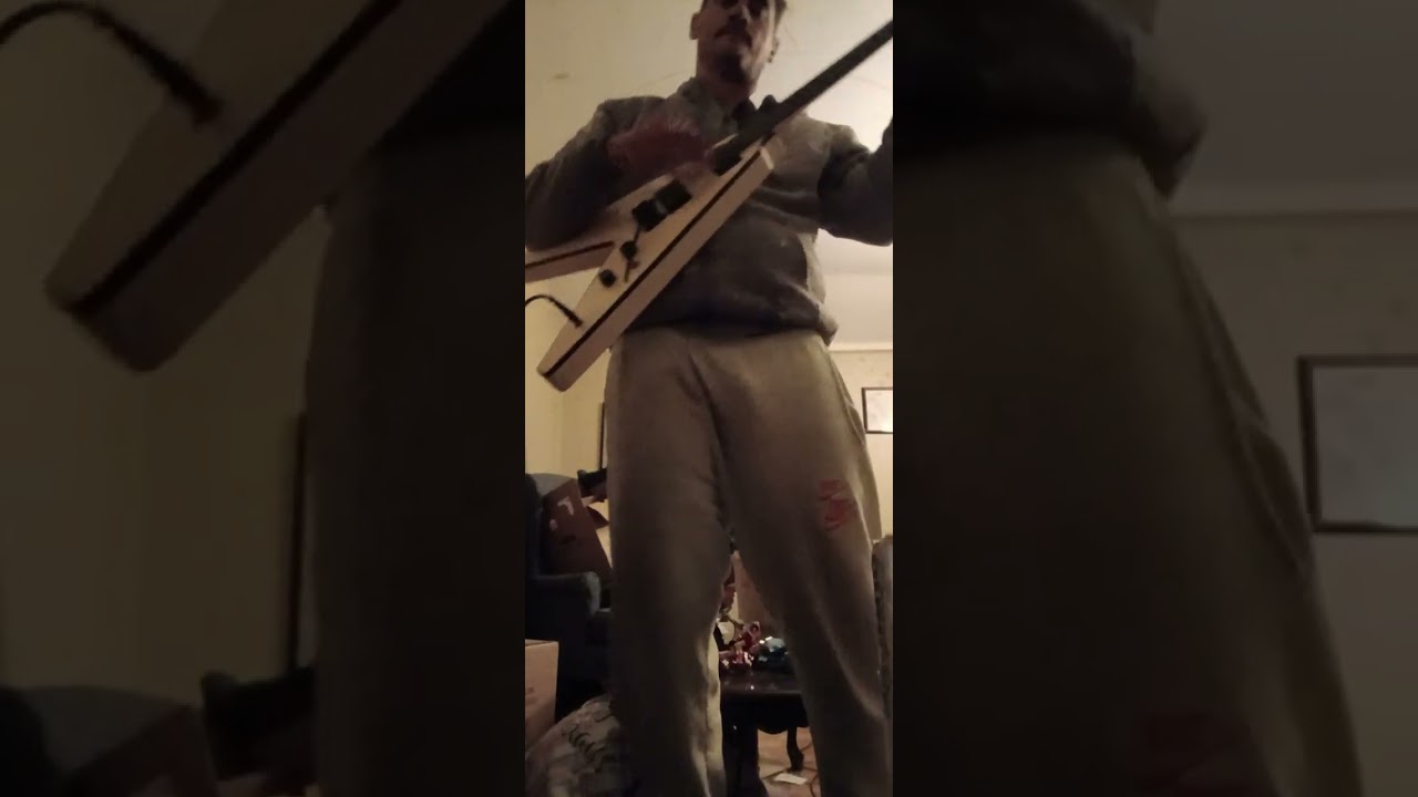 Sexy man playing guitar