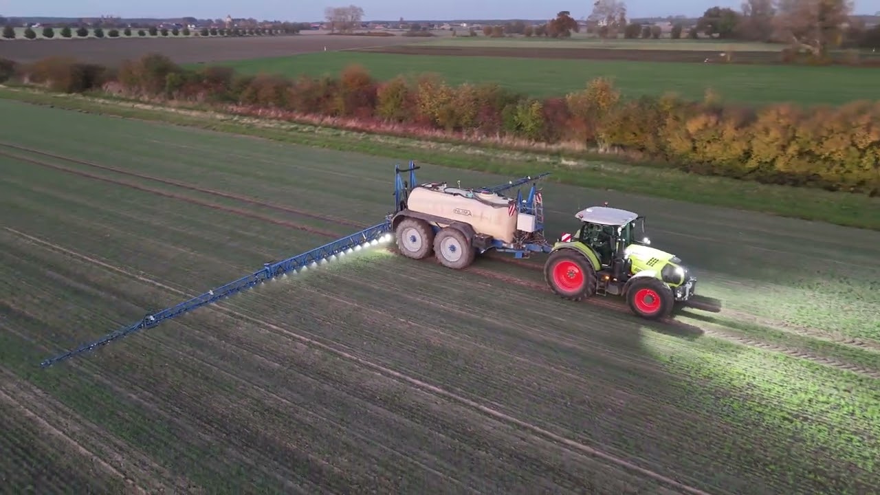 CLAAS AXION 660 mit einer INUMA MARATHON 10030  30 Meter Feldspritze