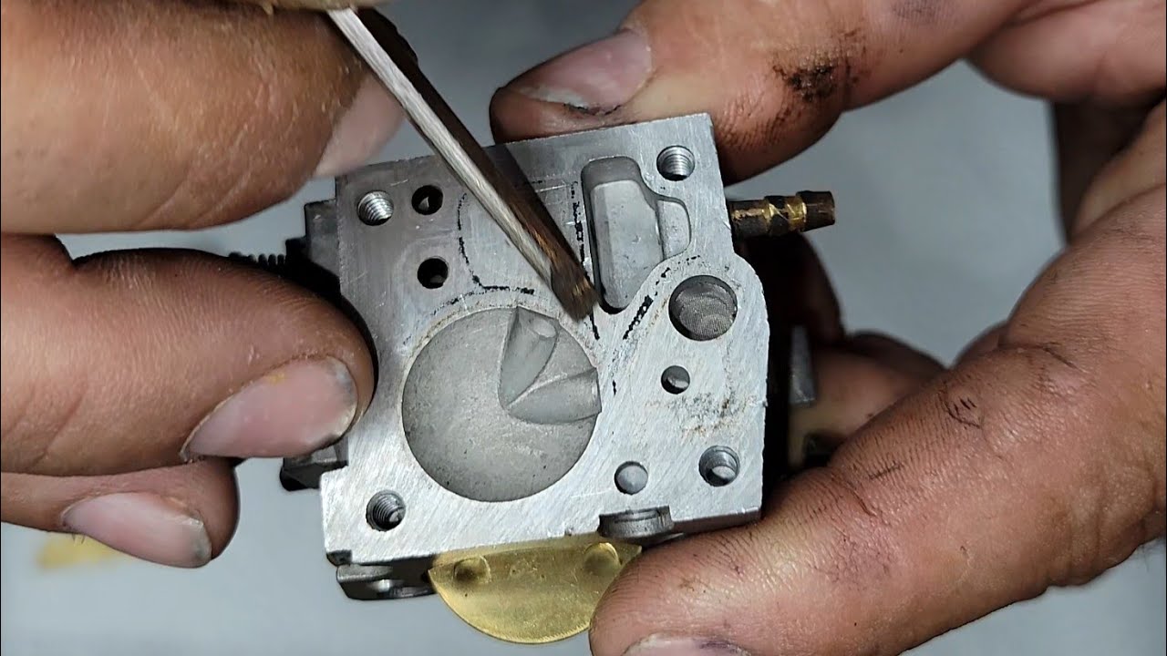 Rebuilding the carb on the 268xp giveaway saw, we're getting close!!
