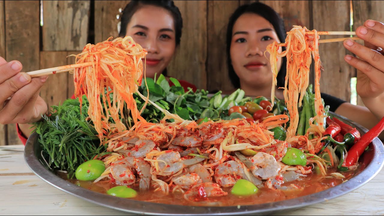 Eating Papaya salad with shrimp