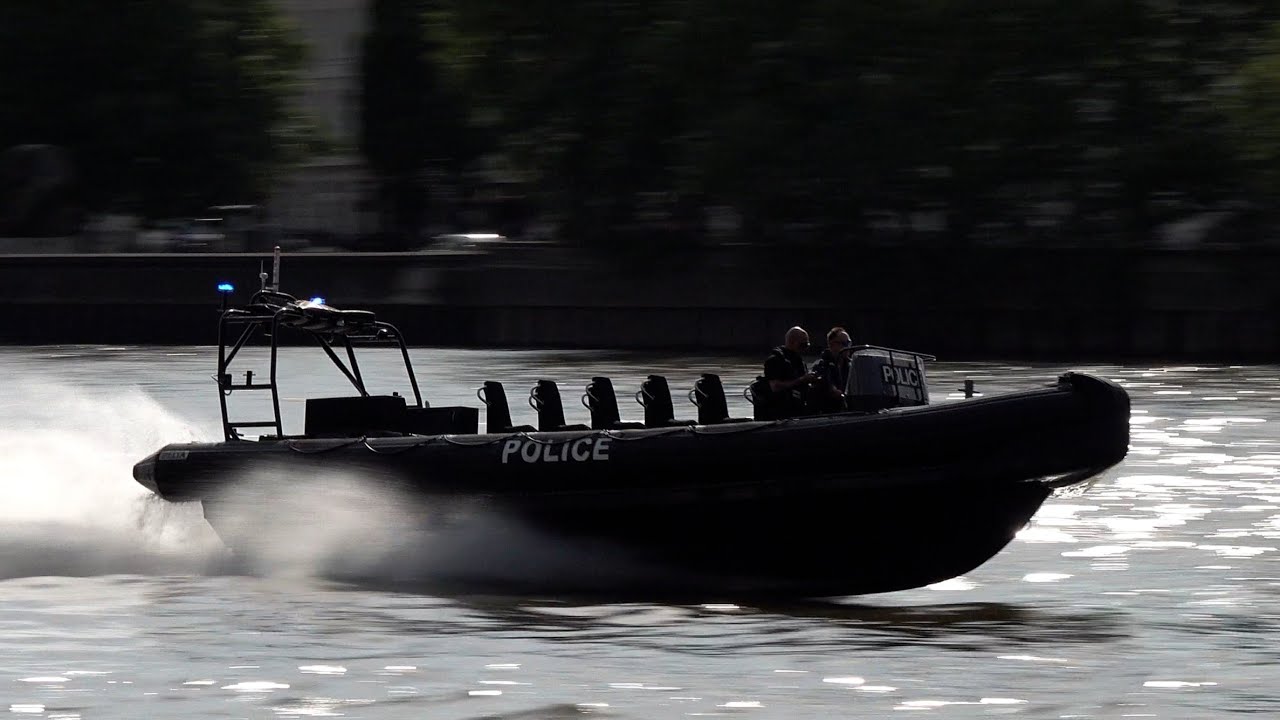 Police boats zooming around and tactical teams raiding a ship during training 🚤