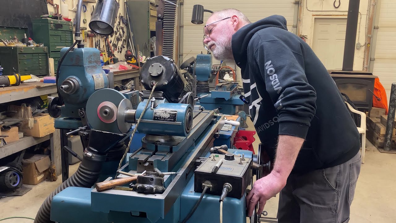 DRESSING, (SHAPING) A DIAMOND GRINDING WHEEL