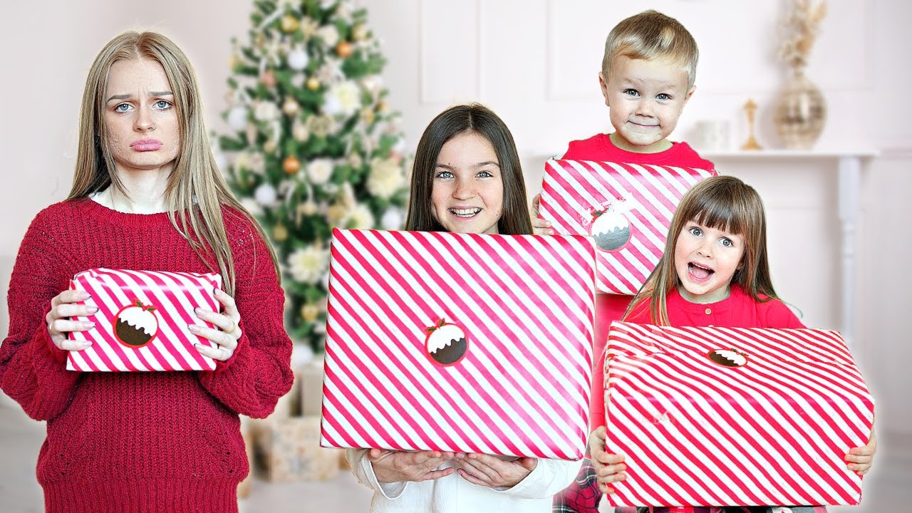 LETTING OUR KIDS OPEN CHRISTMAS PRESENTS EARLY! | Family Fizz