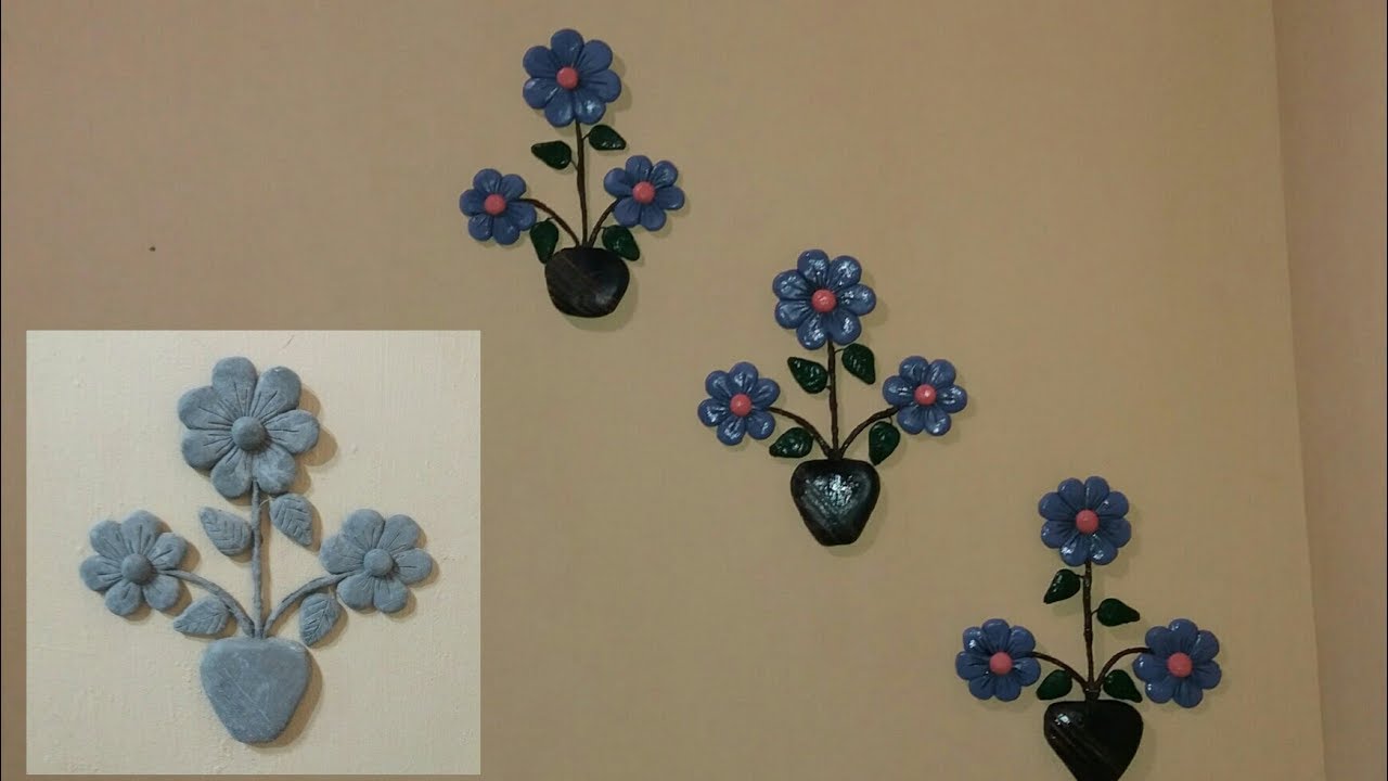 ARRANJO DE  FLORES( PENDURICOS) CIMENTO   flower arrangement