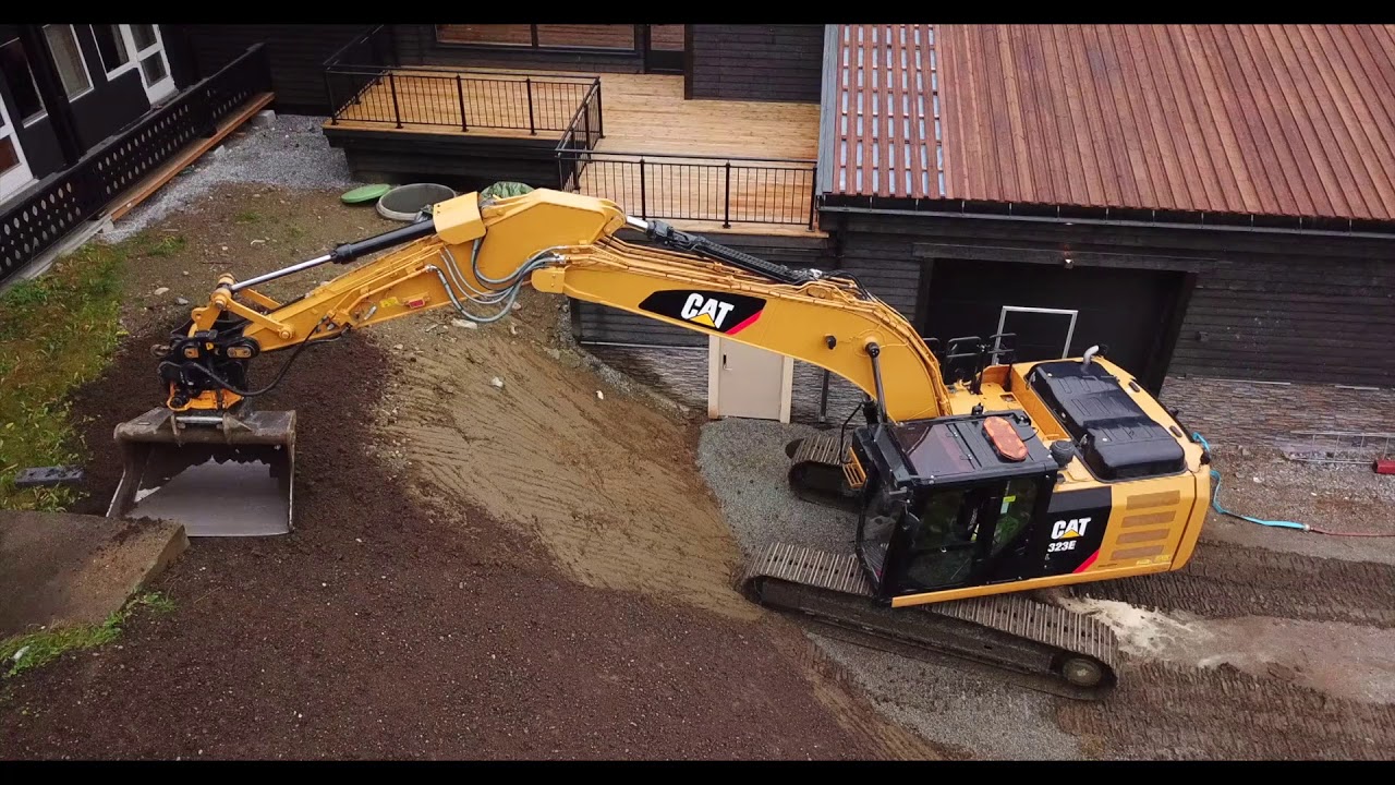 Cat 323E with engcon Tiltrotator