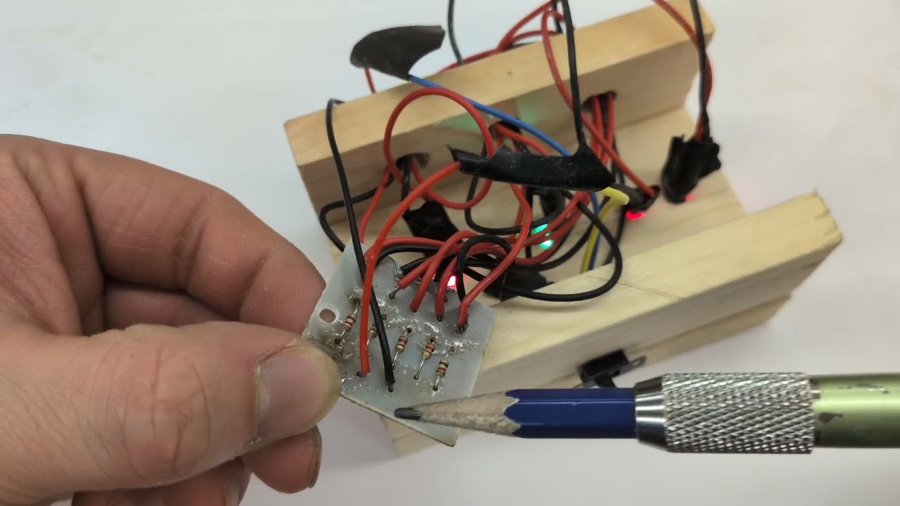 L.E.D. Plexiglass Project 6: Hot Glue Gunning the Battery Snap Wires