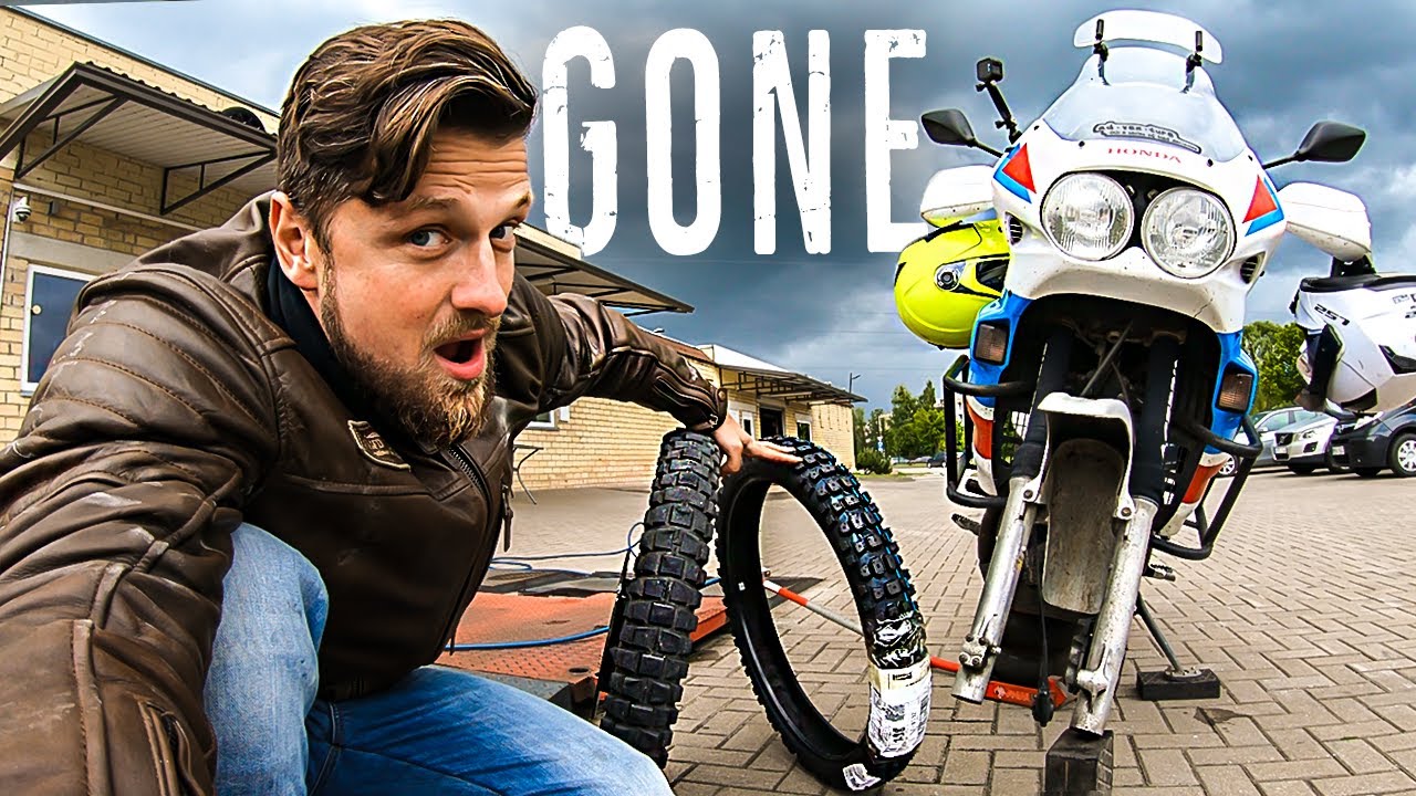 Changing Motorcycle Tire to Street Legal Knobby on Honda Transalp (Lithuania Belarus border ride)