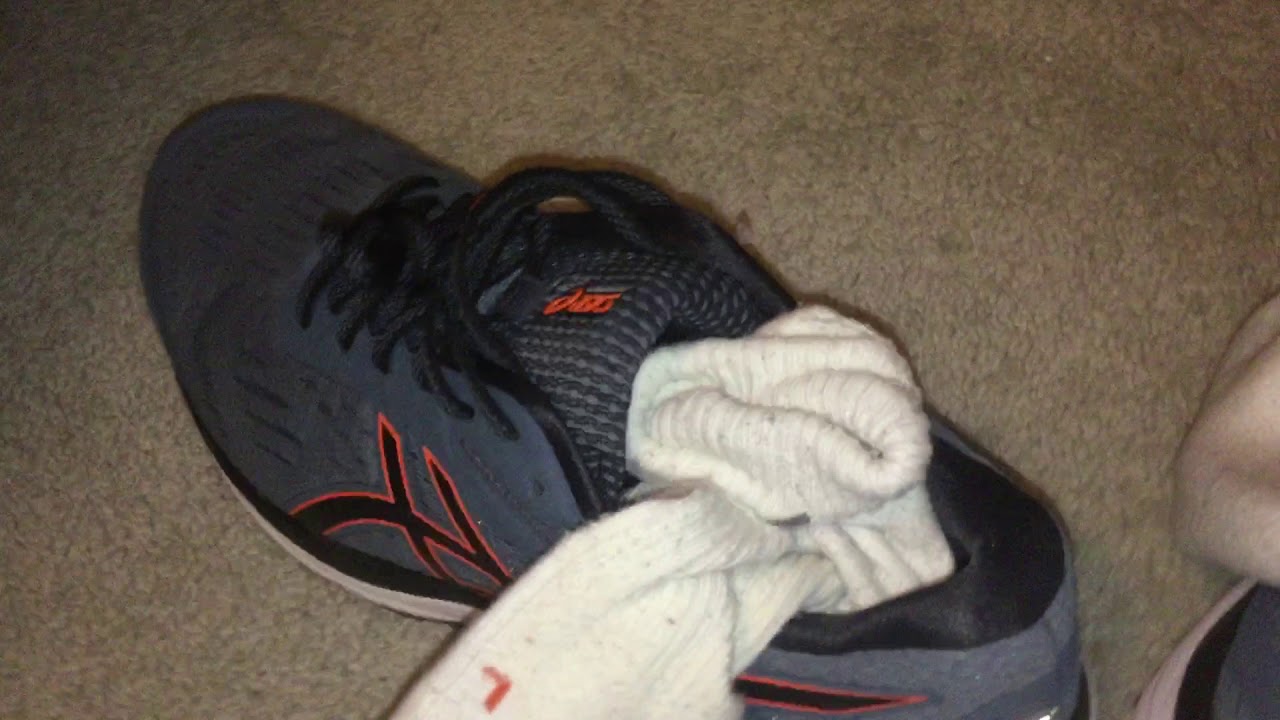 My friends sweaty smelly Asics and Nike white socks