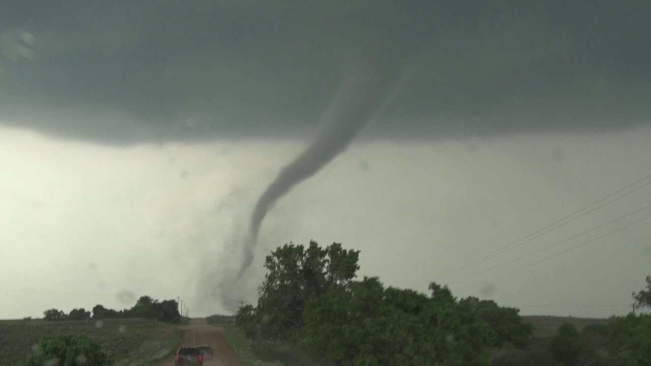 KWTV News 9 StormTrackers Val and Amy Castor track a tornadic supercell SW of Arnett, OK on 5/18/25