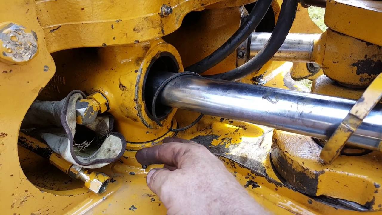 Repair swing cylinder backhoe JD 310 E