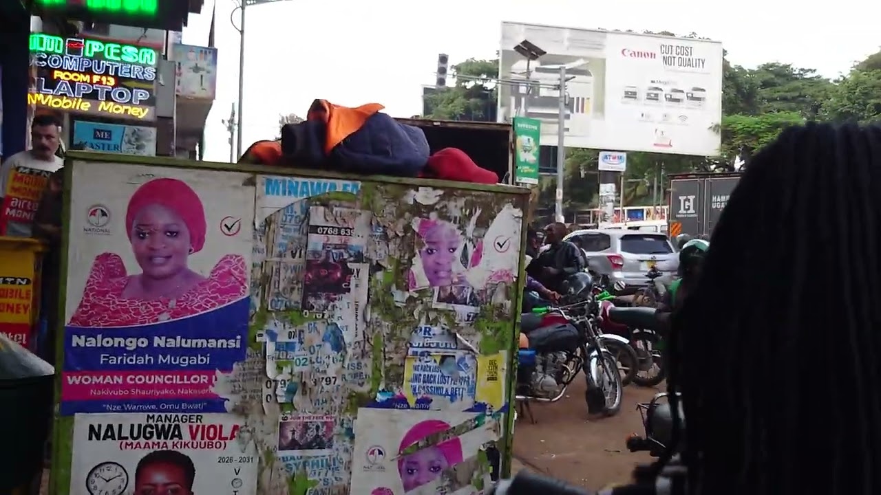 brief walk in the city street near Aloha Park, Uganda. Kampala, kampala. Very calmly,