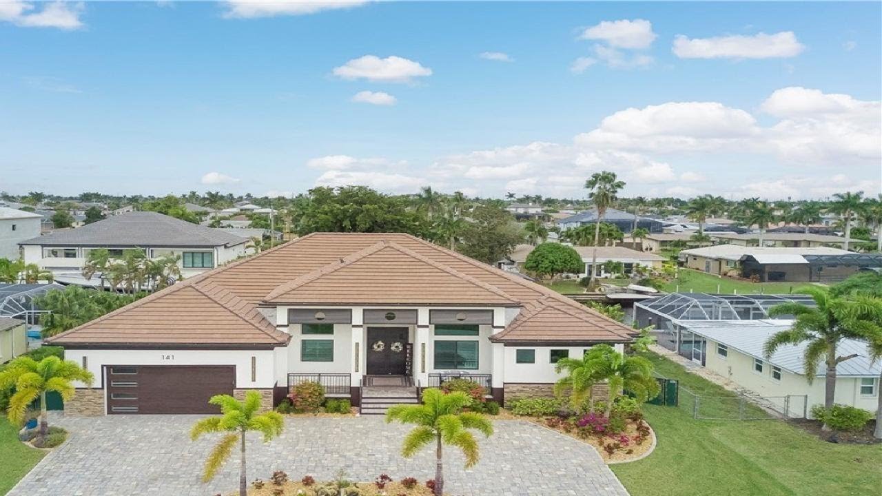 $2.29M Sailboat Access Home | Custom Built Luxury Gulf Access Estate in Cape Coral