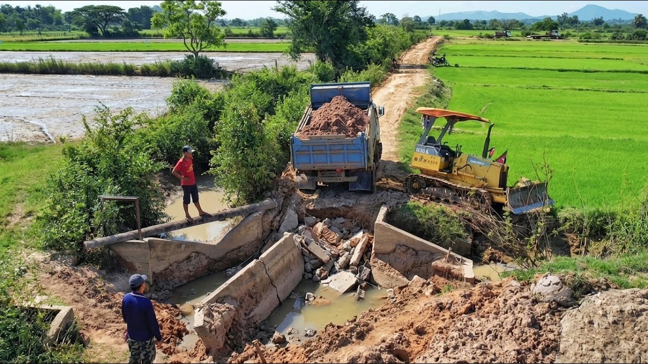 Backfill the damaged canal and drainage system to link the road for farmers&rsquo; travel.