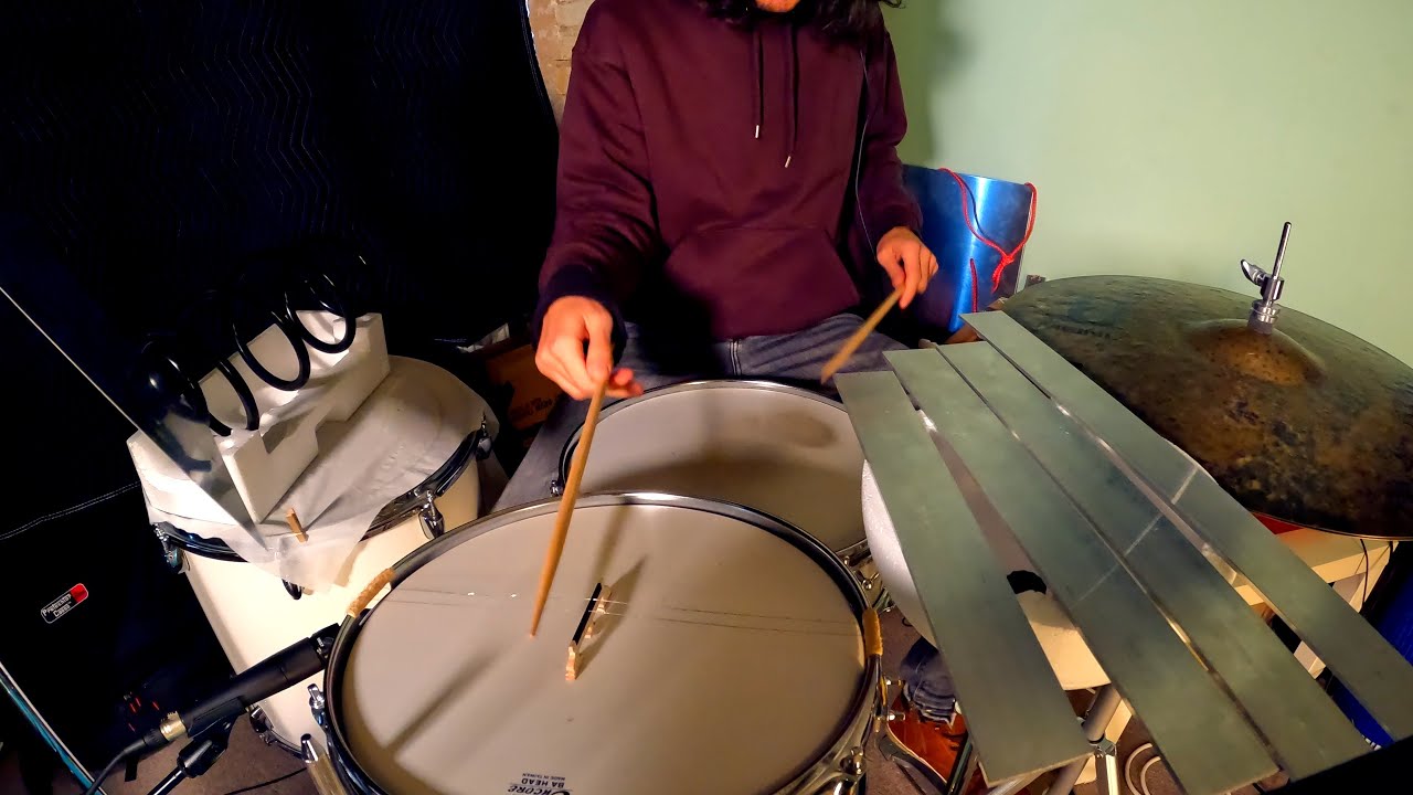 Drum set + Found instruments + Live electronics