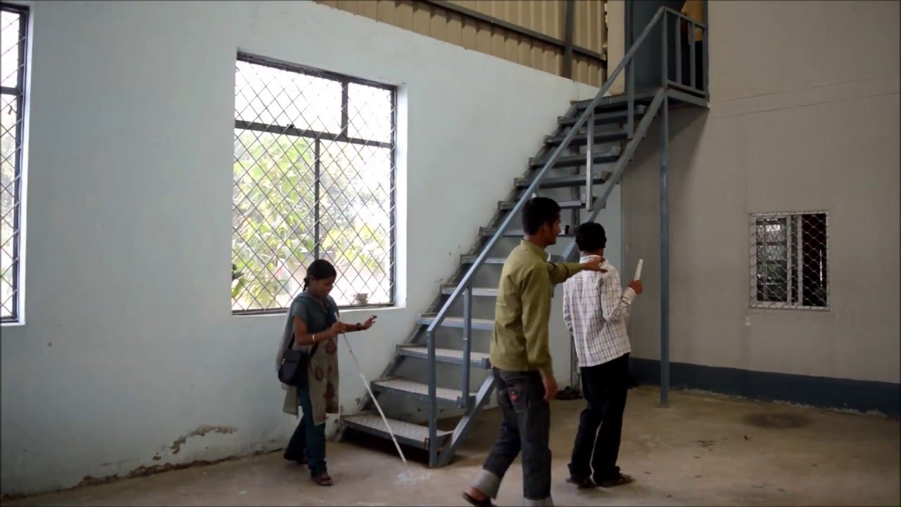 NABET INDIA Employees walking into the office | Training Center for Blind