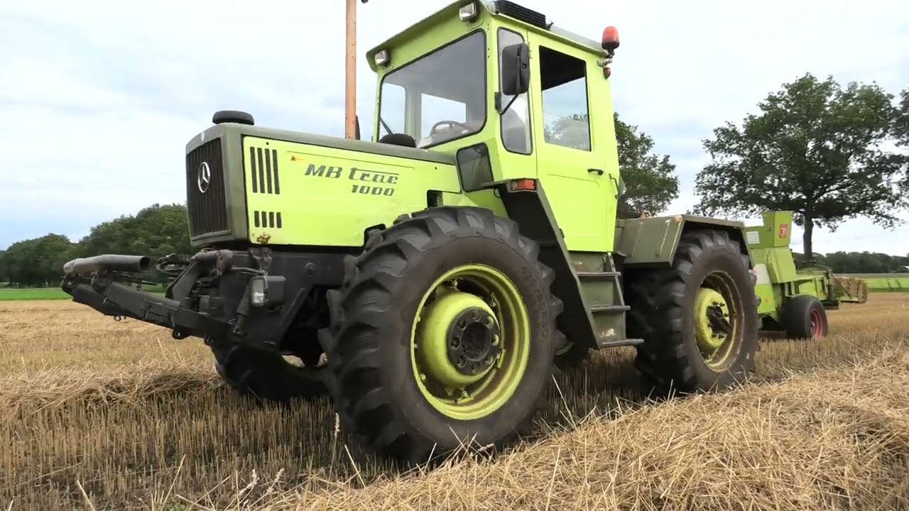 STRO PERSEN MET EEN MB TRAC 1000 EN EEN CLAAS MARKANT 65