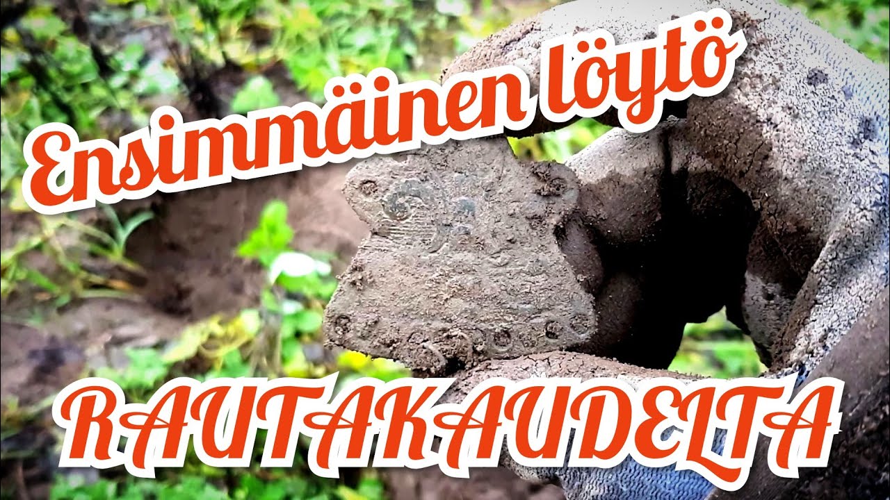 Kurainen viikko pellolla metallinpaljastimen kanssa
