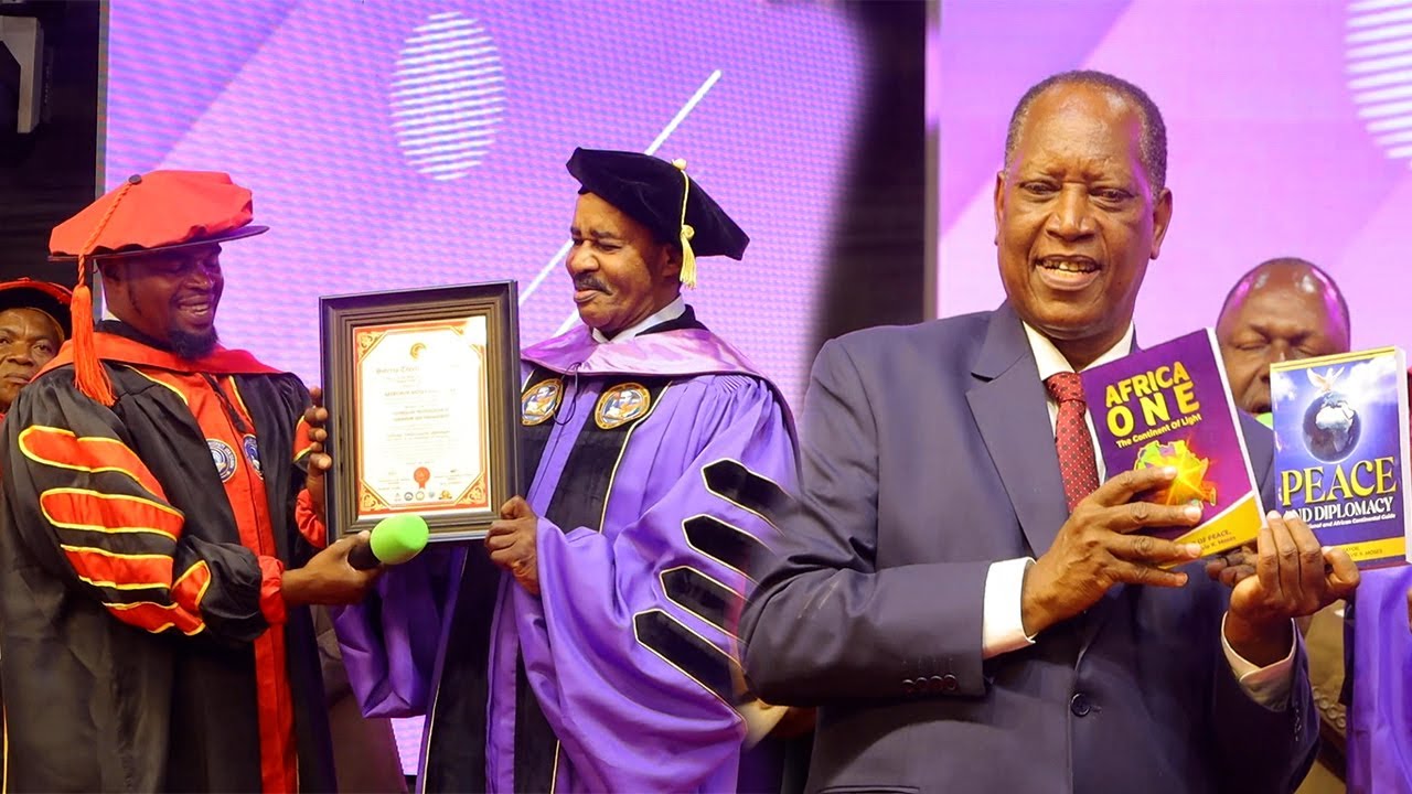NABII MKUU PROF GEORDAVIE ATUNUKIWA RASMI UPROFESA MBELE YA WAZIRI KABUDI, RAIS SAMIA AMTUMIA UJUMBE