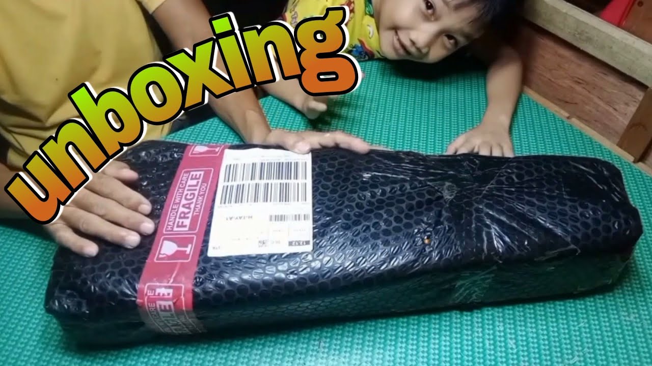 unboxing 21 inches ukulele guitar  from lazada #ukulele