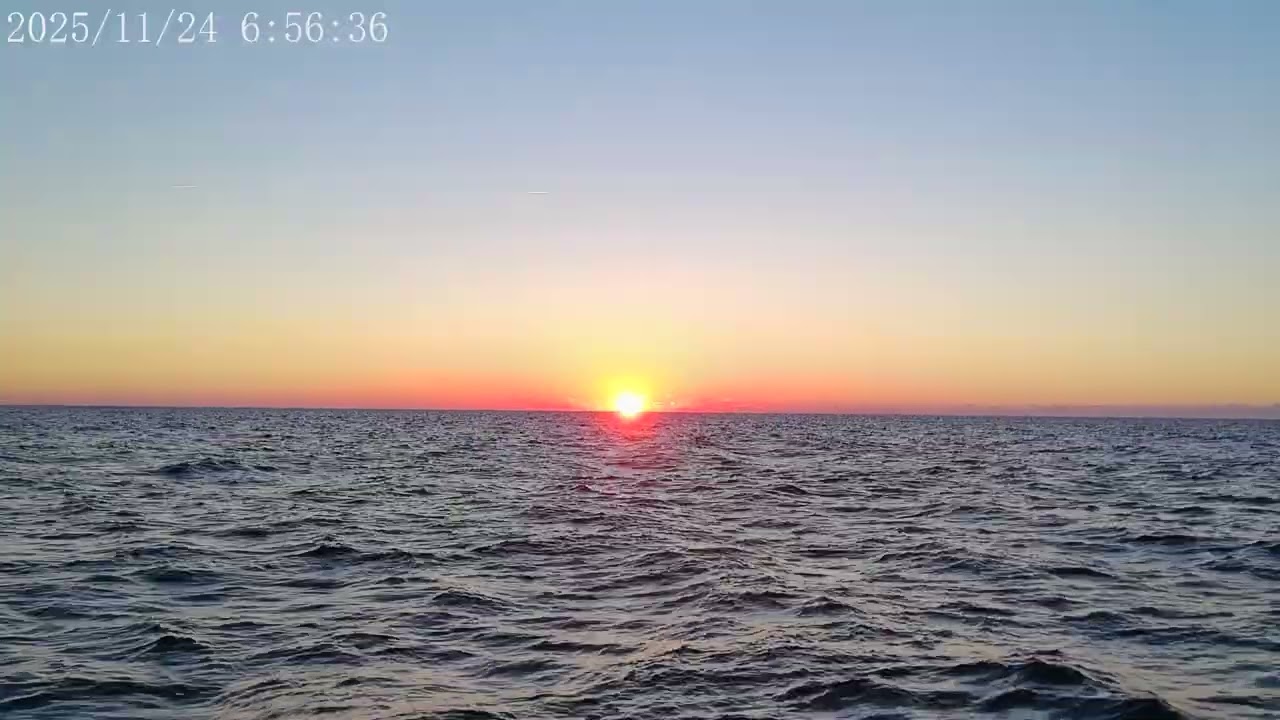First Sunrise at Sea