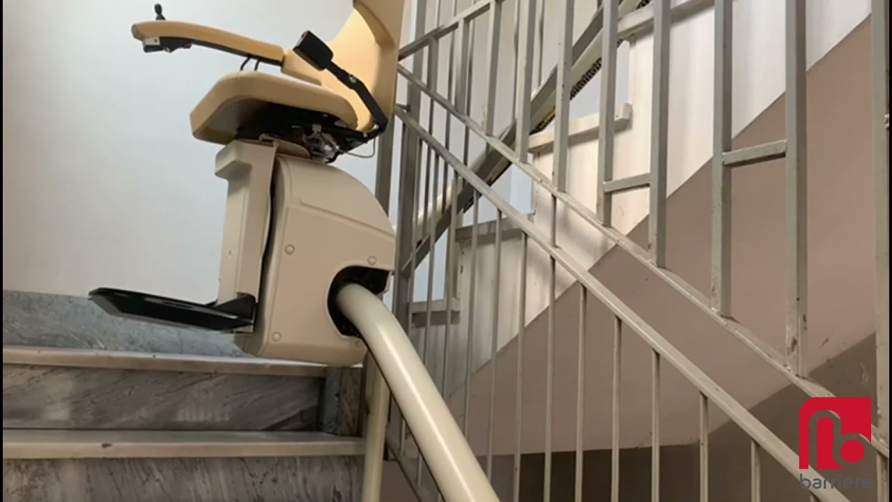 Montascale a poltroncina per scale curve
