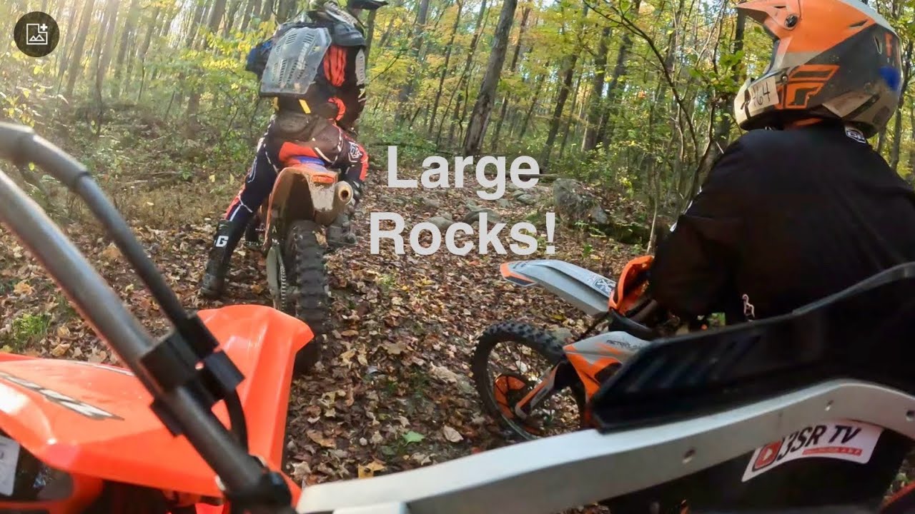 Dirt biking the rocky leaf covered trails