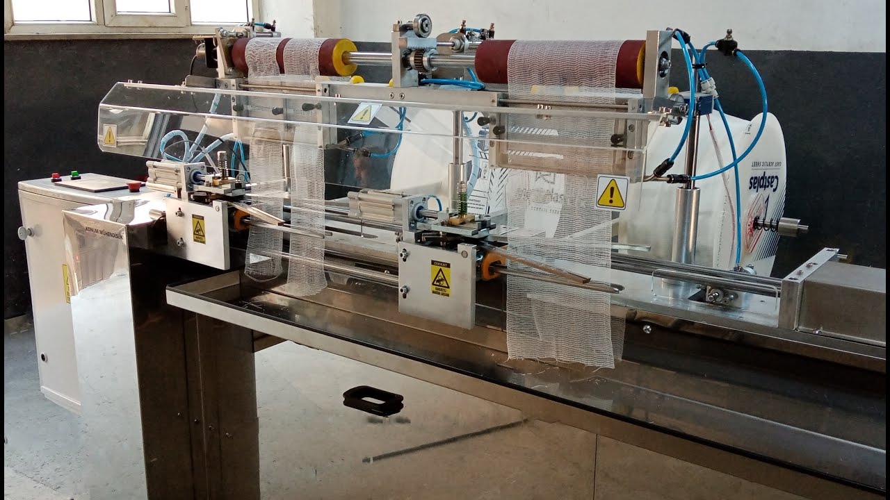 SARGI BEZİ SARIM MAKİNESİ / GAUZE ROLLING CUTTING MACHINE