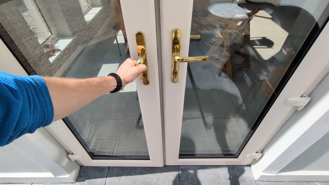 How to adjust the flag hinges on a PVC door that catches