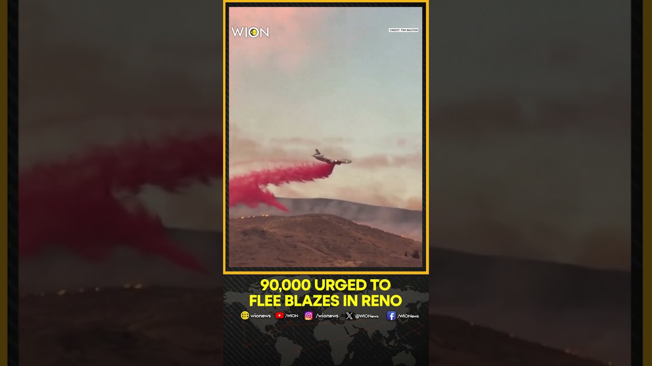 Plane Drops Fire Retardant on Fast-moving Wildfire Flames in Reno Area