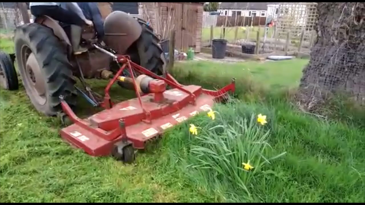 Mowing with the Ferguson 35 and finishing mower