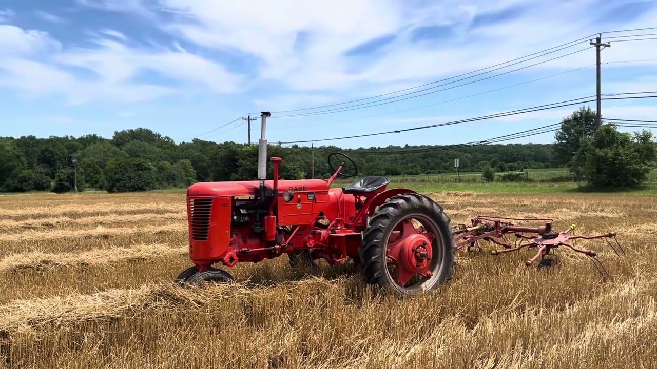 Case VAC Tractor Running a Tedder
