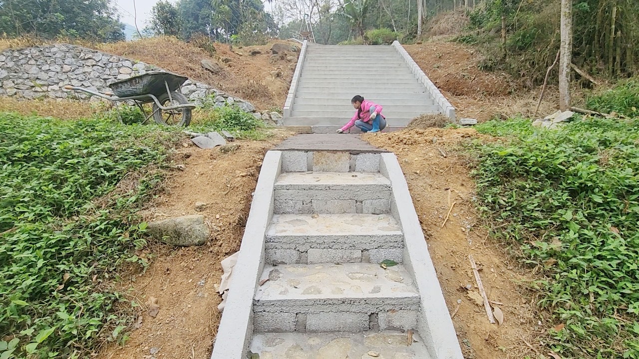 Pouring cement for the walkway leading up the stairs, harvesting cassava.