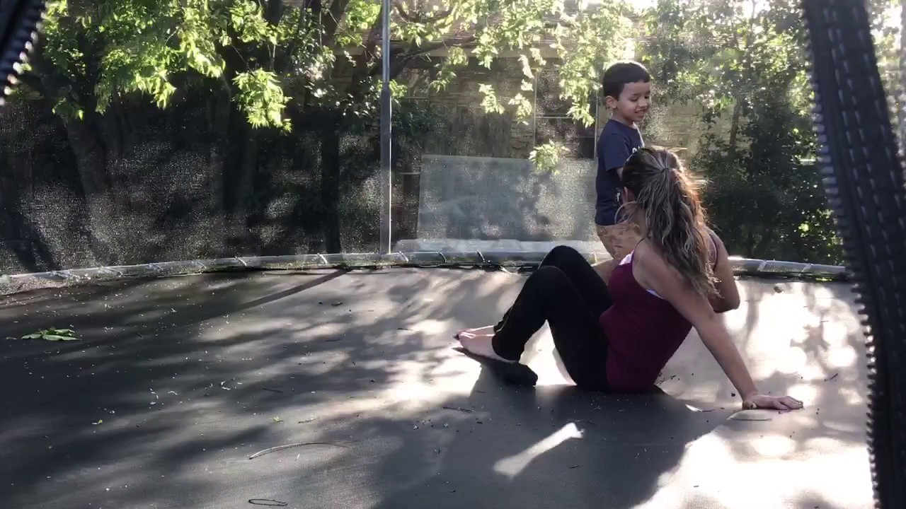 Frank with Mommy on the trampoline