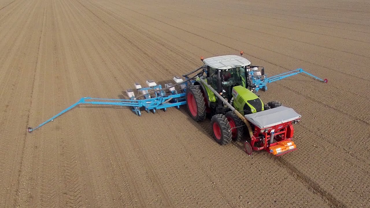 Planting corn with a new Claas Arion 650 + 12 row Monosem