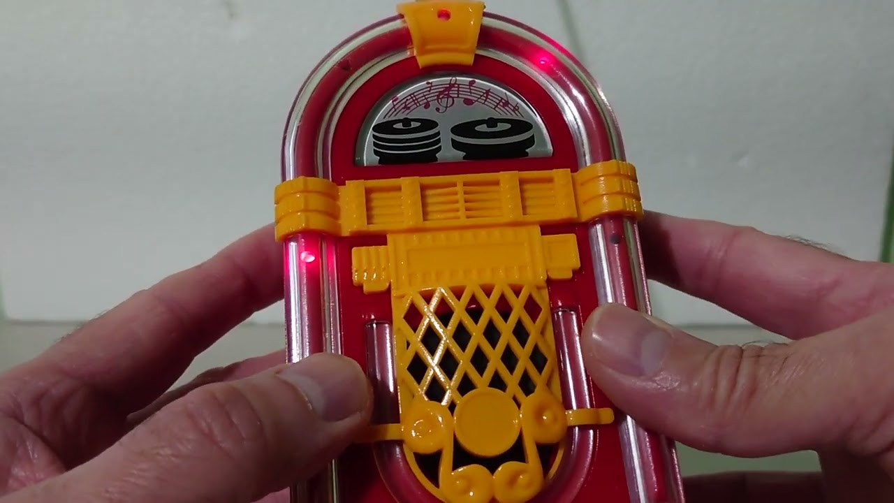 VINTAGE PANASHIBA MINI JUKEBOX  AM/FM RADIO.
