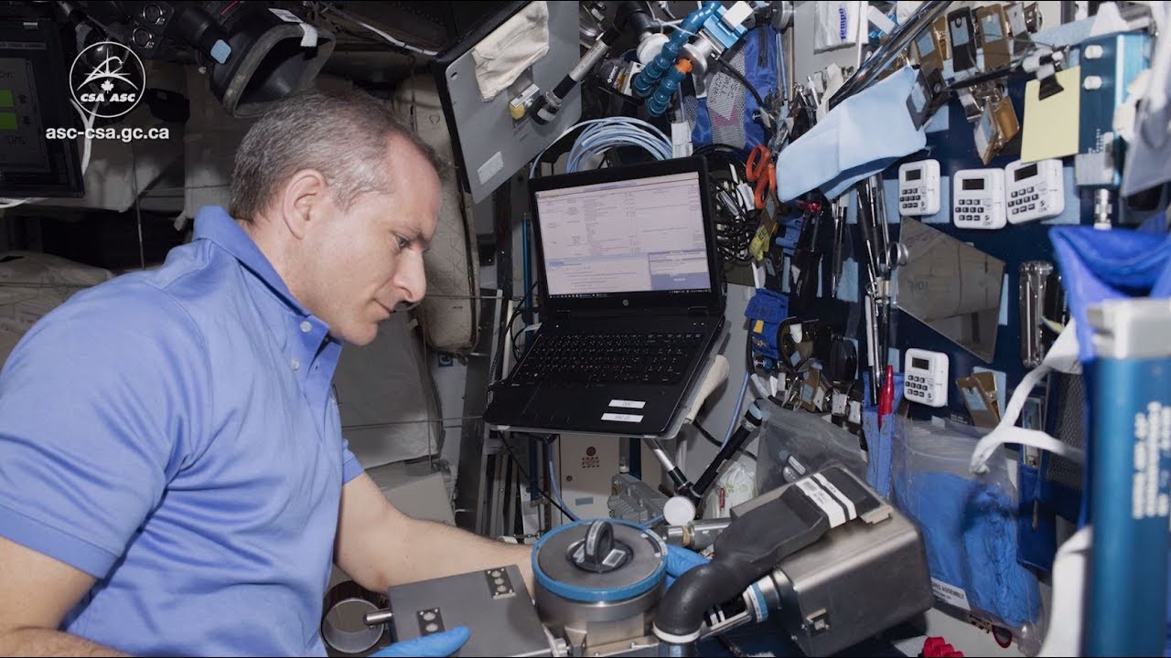 Maintenance on the Combustion Integrated Rack aboard the International Space Station