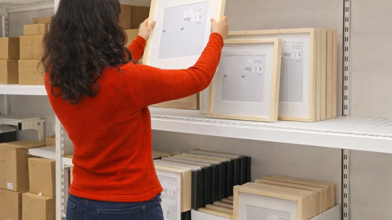 Grab a cheap IKEA picture frame - this entryway idea is GENIUS!
