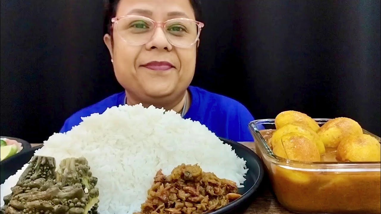 Huge rice and egg kosha with karela and dry fish