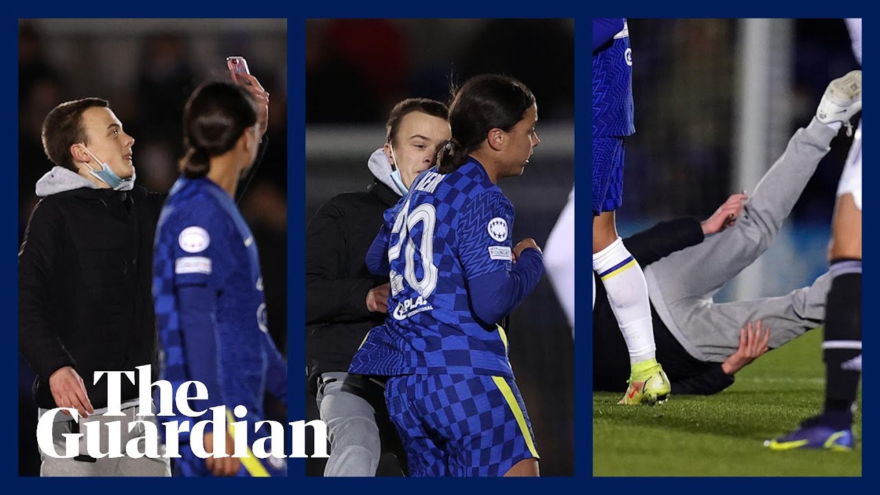Chelsea striker Sam Kerr knocks pitch invader to ground during Champions League match