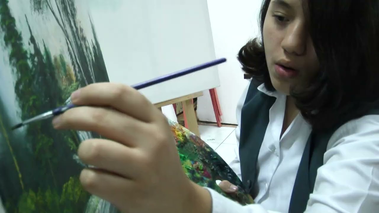 Professor Alaa Youssef  teaching how to draw with oil paint
